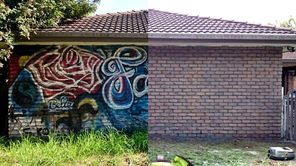 Graffiti removed from brick wall